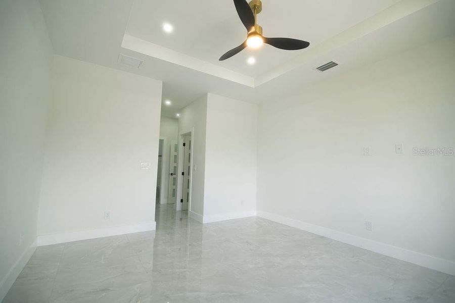 Spacious, unfurnished interior of a new home in , Port Charlotte (Image 32).