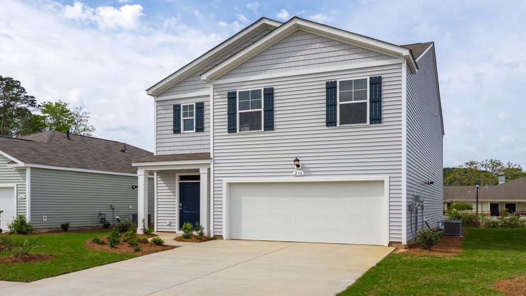 Representative exterior photo of a completed home built from the ROBIE by D.R. Horton in Island Green, Myrtle Beach, SC (Image 26).