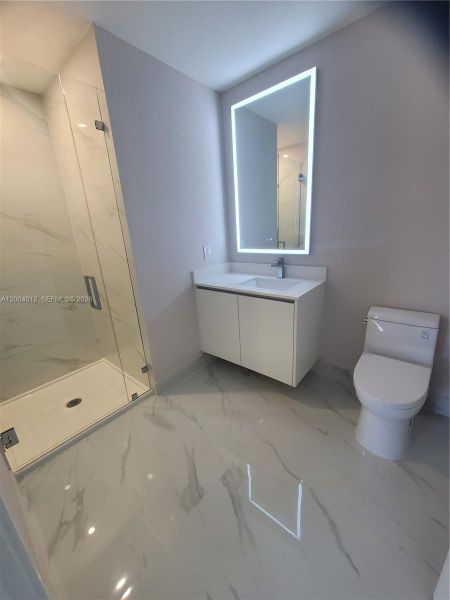 Designer mirrors and shower glass doors