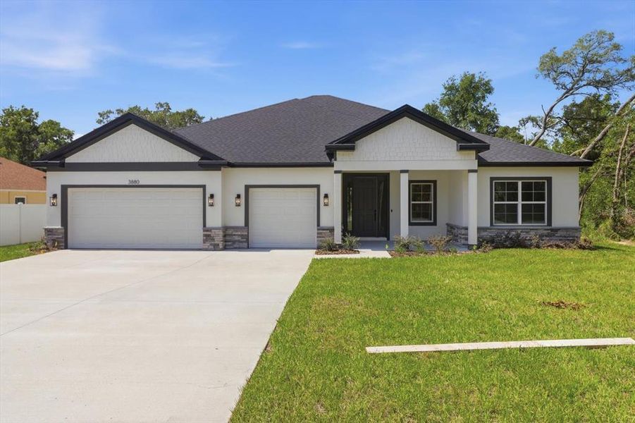 Front exterior of a new home in , Ocala, FL, highlighting curb appeal (Image 1). Front exterior of a new home in , Ocala, FL, highlighting curb appeal (Image 1).