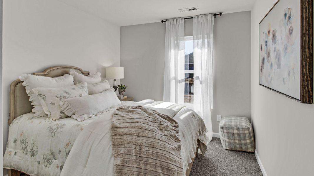 Representative furnished interior of a home built from the Freeport by D.R. Horton in Bailey Park, Fayetteville (Image 13).