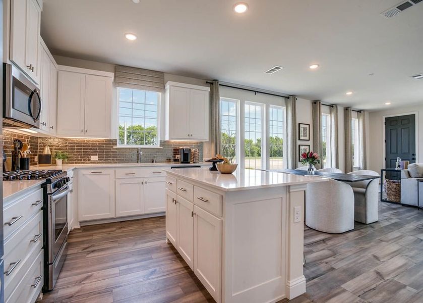 Image 12 representing the Dogwood by CB JENI Homes in The Grove, Frisco, TX.