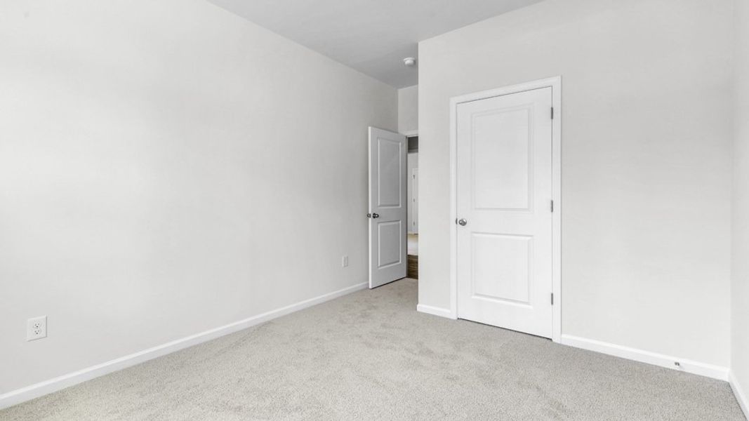 Spacious, unfurnished interior of a new home in Villa Grande, Winterville (Image 22).