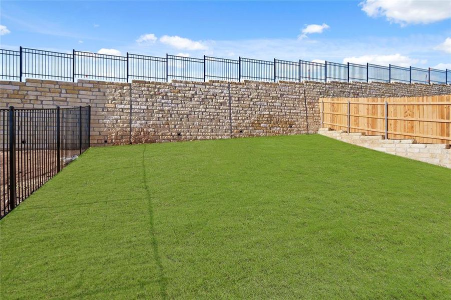 Yard in the Pecan II home plan by Trophy Signature Homes – REPRESENTATIVE PHOTO Yard in the Pecan II home plan by Trophy Signature Homes – REPRESENTATIVE PHOTO