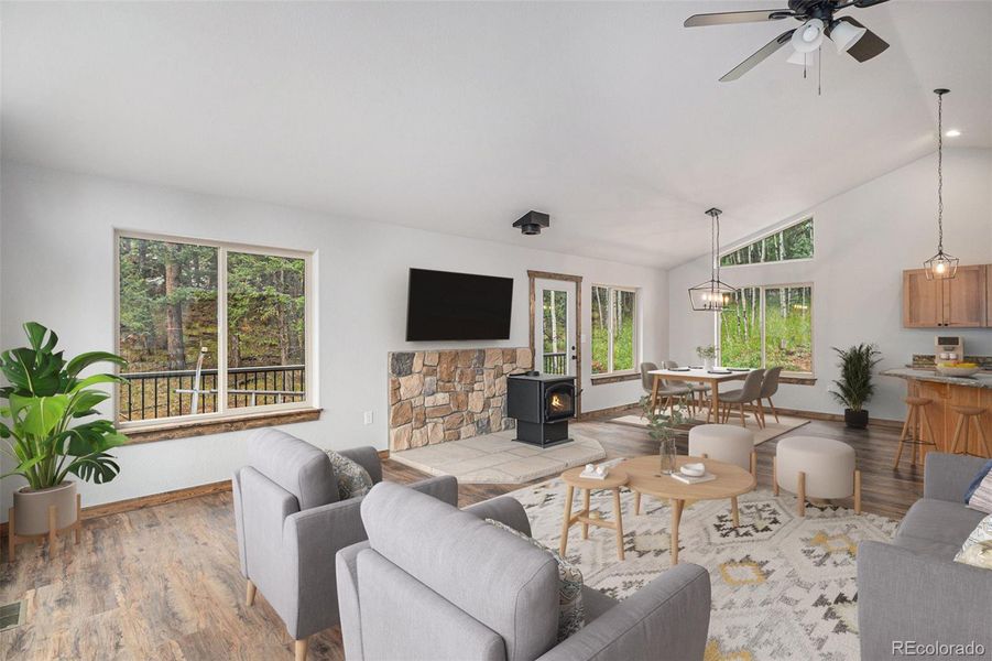 Open concept, living, dining and kitchen-virtually staged.