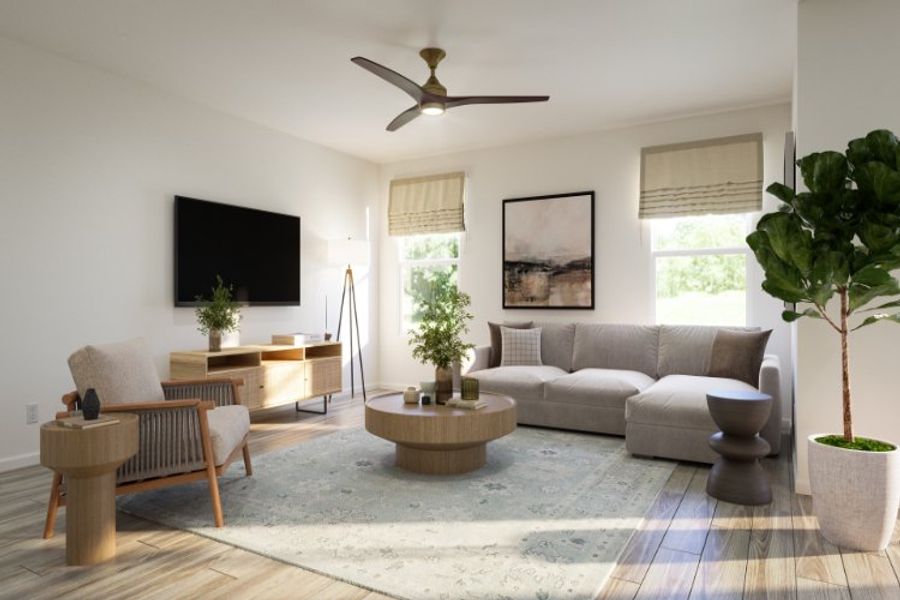 A living room with a tv and couches.