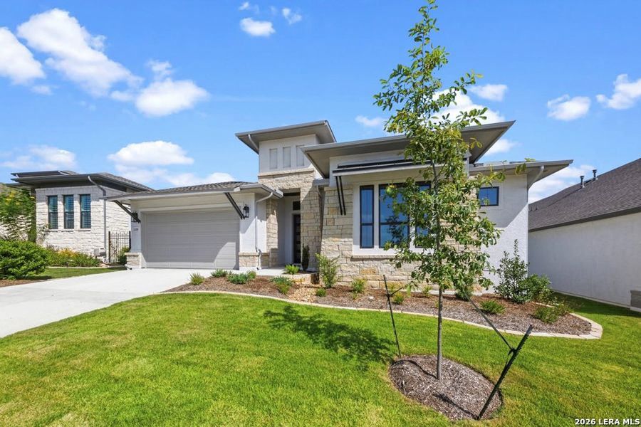 Front exterior of a new home in , San Antonio, TX, highlighting curb appeal (Image 24).