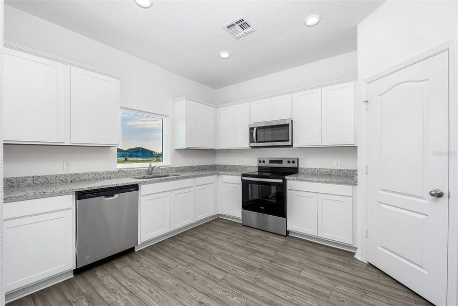 Furnished interior view inside a new home in Gum Lake Preserve, Lake Alfred (Image 13).