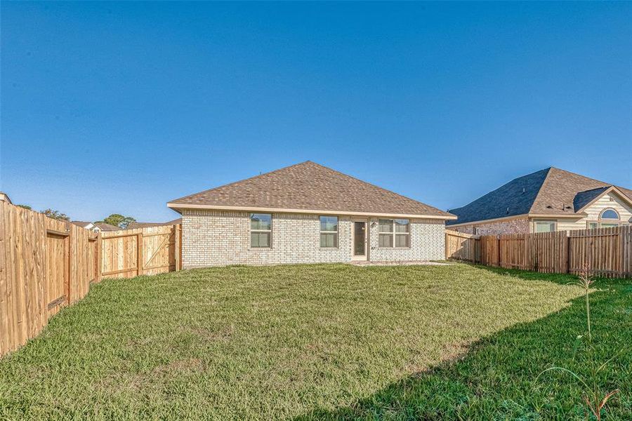 Front exterior of a new home in Bayou Maison, Dickinson, TX, highlighting curb appeal (Image 2). Front exterior of a new home in Bayou Maison, Dickinson, TX, highlighting curb appeal (Image 2).