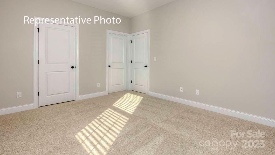 Spacious, unfurnished interior of a new home in Sanctuary at Southgate, Indian Trail (Image 28).