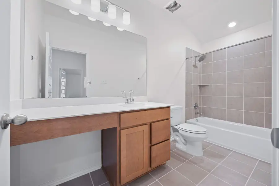 Furnished interior view inside a new home in Salerno - Classic Collection, Round Rock (Image 7). Furnished interior view inside a new home in Salerno - Classic Collection, Round Rock (Image 7).