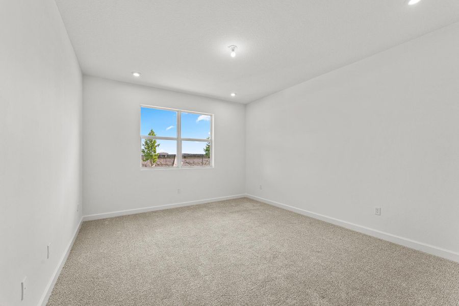 Spacious, unfurnished interior of a new home in Tradition - Cadence, Port St. Lucie (Image 9).