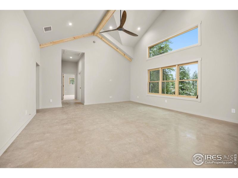 Southern facing living room with custom ceiling details and large ceiling fan Southern facing living room with custom ceiling details and large ceiling fan