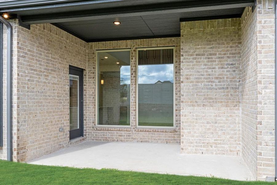Exterior details and patio area of a home in Painted Tree Woodland District 50, McKinney (Image 19). Exterior details and patio area of a home in Painted Tree Woodland District 50, McKinney (Image 19).
