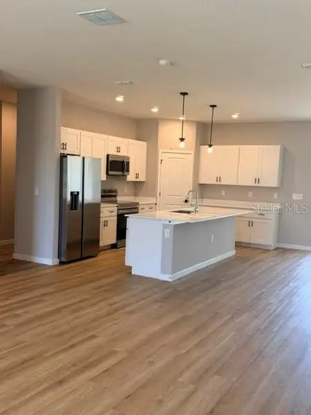 Furnished interior view inside a new home in , Ocala (Image 3).