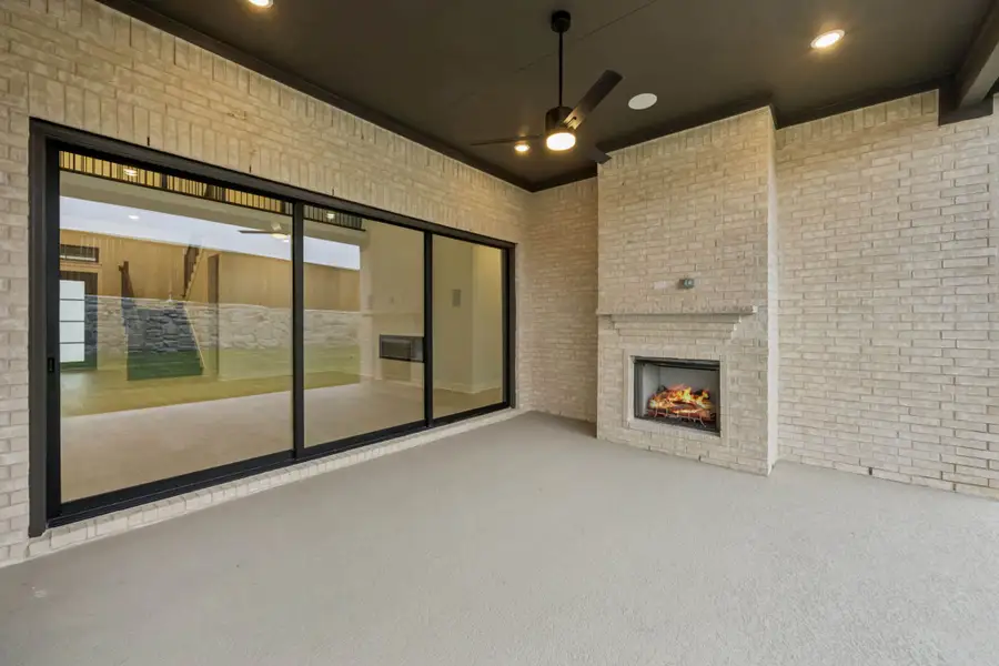Exterior details and patio area of a home in Canyon Falls 70s, Argyle (Image 3).