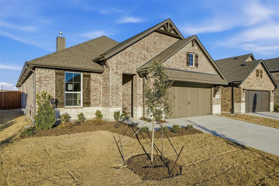 Front exterior of a new home in Morningstar, Aledo, TX, highlighting curb appeal (Image 19).