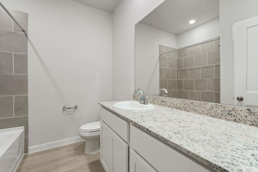 Furnished interior view inside a new home in Lexington Heights, Willis (Image 10). Furnished interior view inside a new home in Lexington Heights, Willis (Image 10).