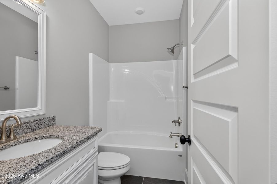 Furnished interior view inside a new home in Highland Lakes, Evans (Image 11).