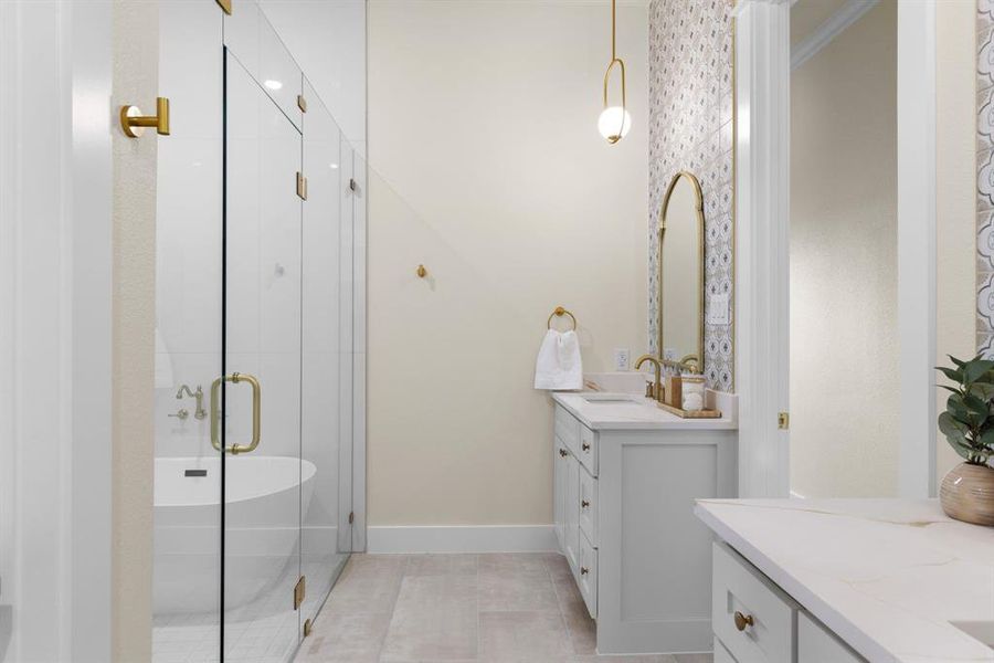 Bathroom with crown molding, tile patterned flooring, vanity, and independent shower and bath