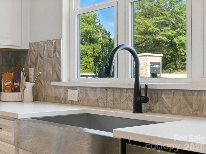 Large single bowl stainless steel sink with touch faucet