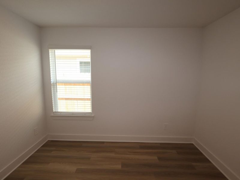 Spacious, unfurnished interior of a new home in Lone Star Landing, Montgomery (Image 30).