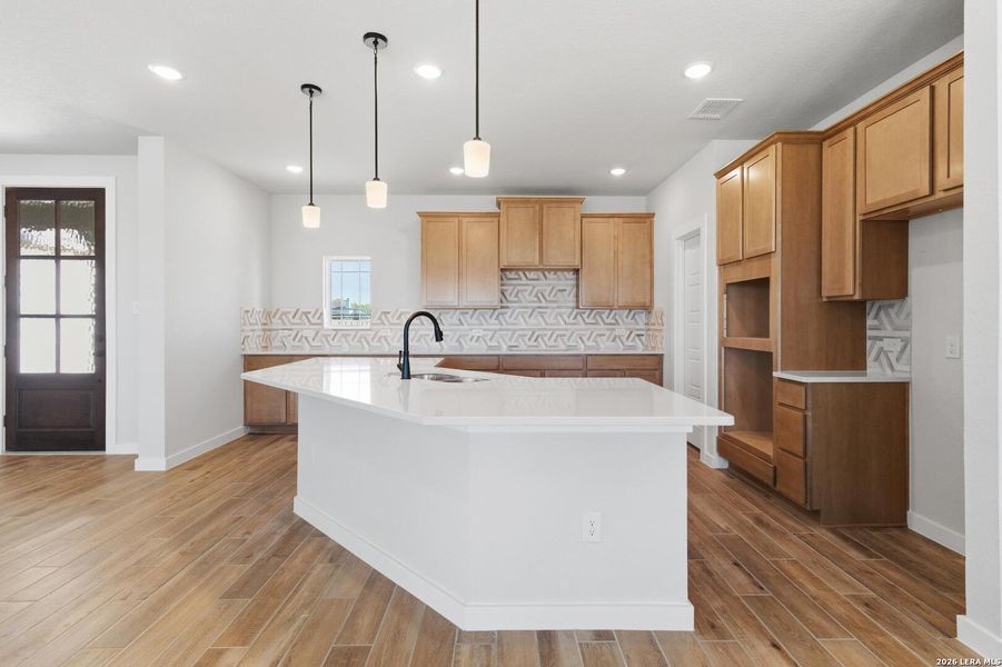 Furnished interior view inside a new home in Alamo Estates, San Antonio (Image 11).