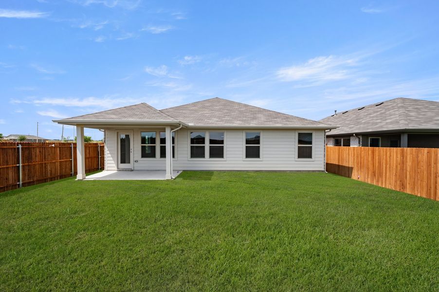Front exterior of a new home in Terra Vella, Haslet, TX, highlighting curb appeal (Image 25). Front exterior of a new home in Terra Vella, Haslet, TX, highlighting curb appeal (Image 25).