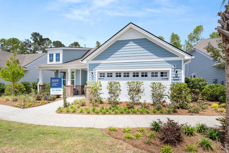 Front exterior of a new home in Del Webb Savannah at Heartwood, Richmond Hill, GA, highlighting curb appeal (Image 1). Front exterior of a new home in Del Webb Savannah at Heartwood, Richmond Hill, GA, highlighting curb appeal (Image 1).
