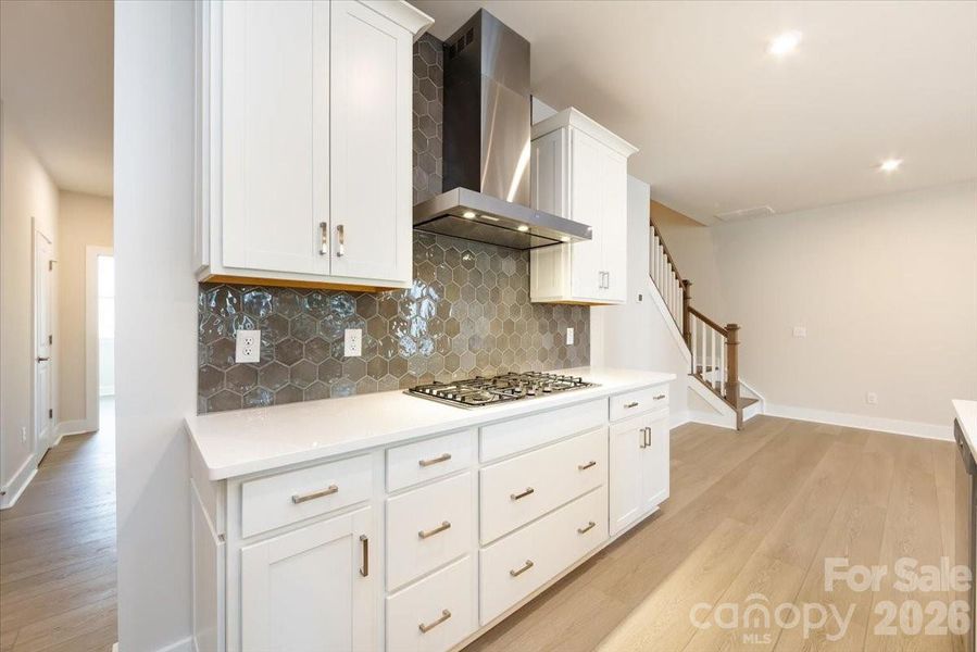 Gourmet Kitchen featuring Brushed Satin Nickel Hardware