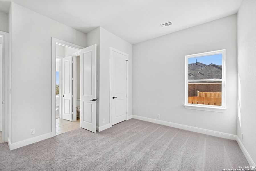 Spacious, unfurnished interior of a new home in Windsong - Legacy Series, Boerne (Image 32).