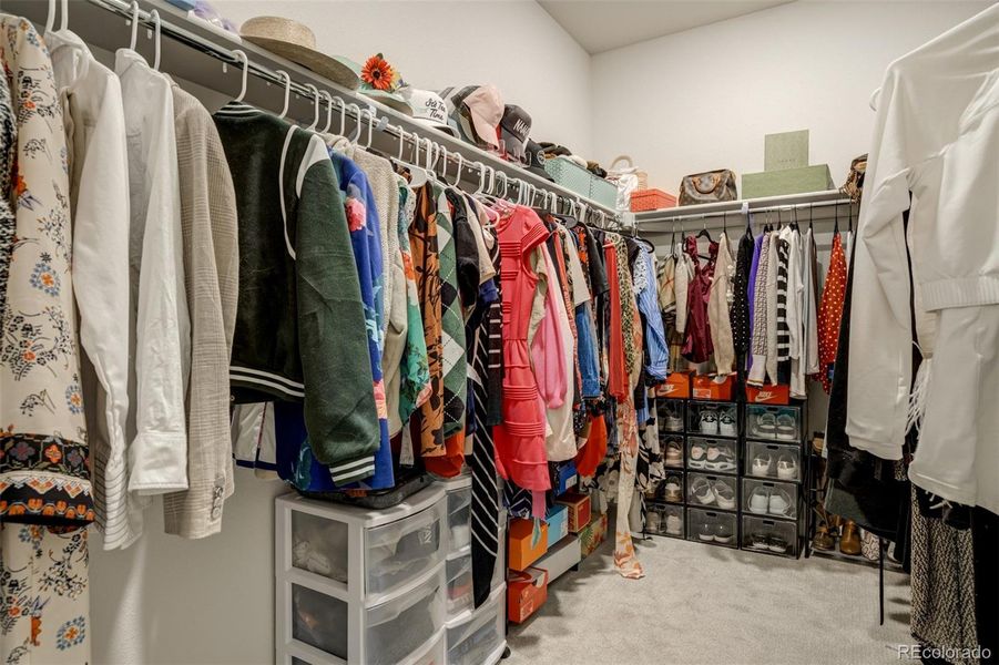 Primary walk-in closet Primary walk-in closet