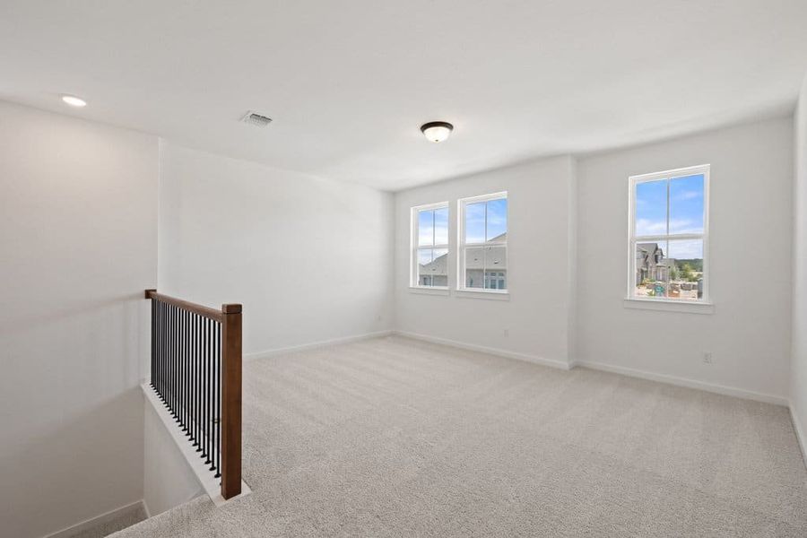 Spacious, unfurnished interior of a new home in Lariat, Liberty Hill (Image 45).