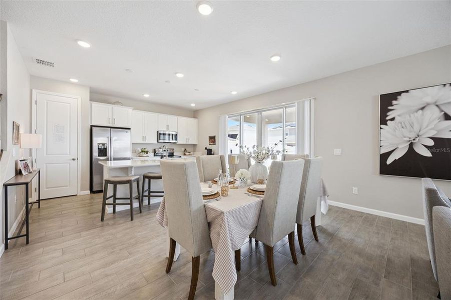 Furnished interior view inside a new home in Seasons at The Grove, Mascotte (Image 28).