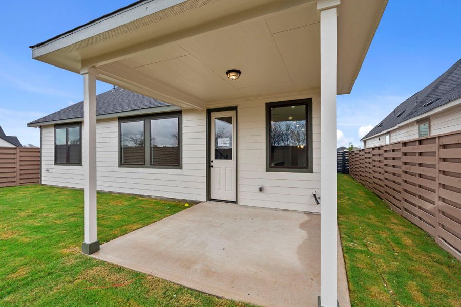 Exterior details and patio area of a home in Austin Point, Richmond (Image 4).