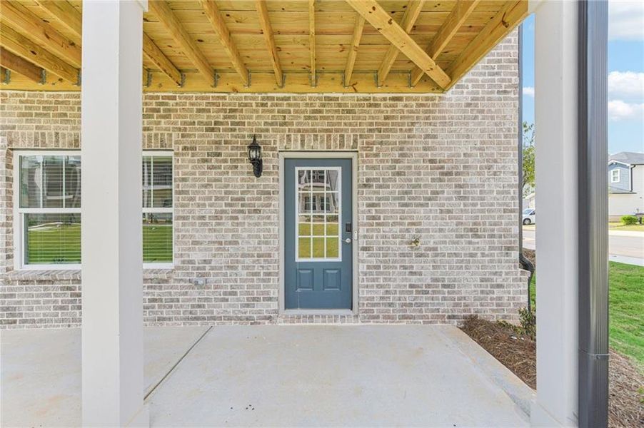 Exterior details and patio area of a home in Martin Springs - Highland Series, Lawrenceville (Image 4).