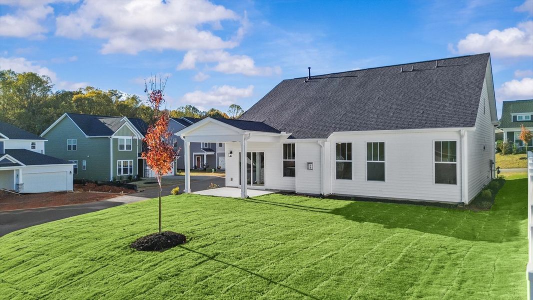 Established charm meets functional outdoor living with a spacious rear covered porch