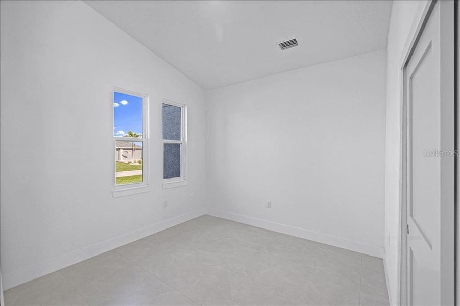 Spacious, unfurnished interior of a new home in , Port Charlotte (Image 26).