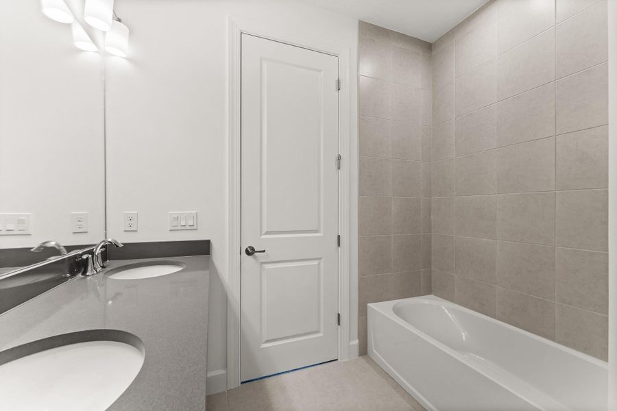 Furnished interior view inside a new home in Tradition - Seville, Port St. Lucie (Image 3). Furnished interior view inside a new home in Tradition - Seville, Port St. Lucie (Image 3).