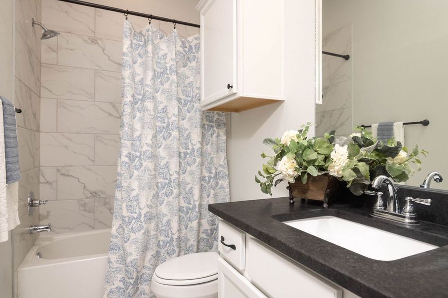 Representative furnished interior of a home built from the The Laurel by Avonley Homes in Greens Prairie Reserve, College Station (Image 17).