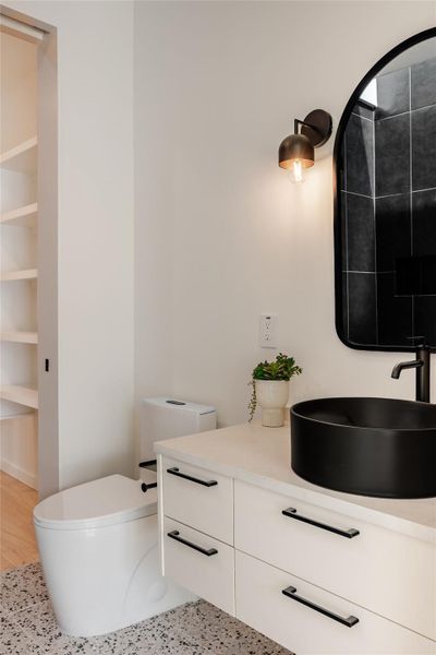 Bathroom with vanity and toilet