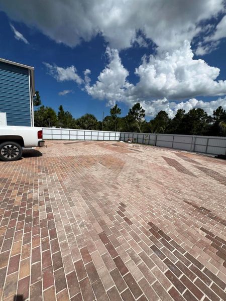 Front exterior of a new home in , Palm Bay, FL, highlighting curb appeal (Image 26).