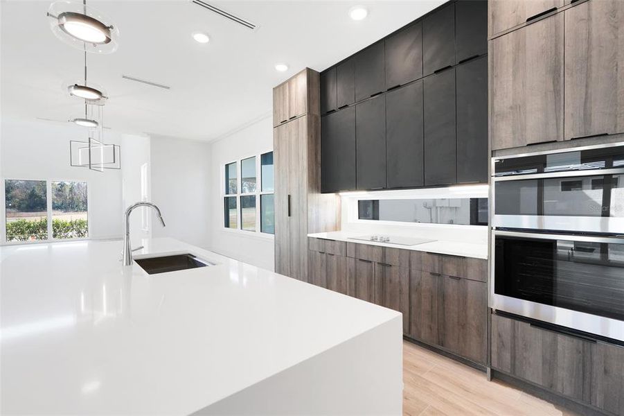 Furnished interior view inside a new home in Hampton Green at Providence, Davenport (Image 9).