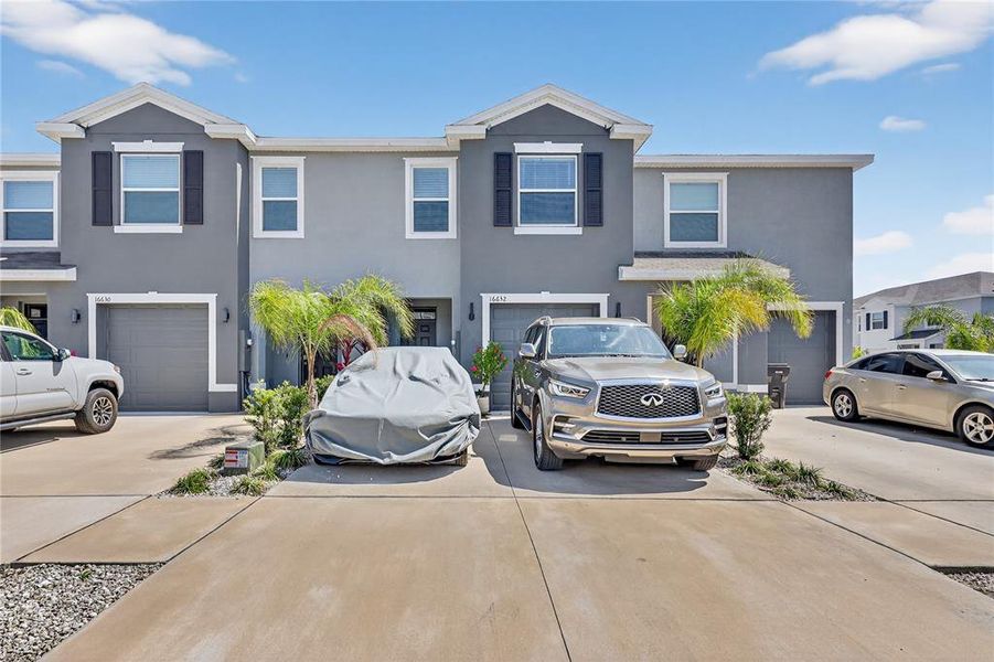 Front exterior of a new home in , Wimauma, FL, highlighting curb appeal (Image 2). Front exterior of a new home in , Wimauma, FL, highlighting curb appeal (Image 2).