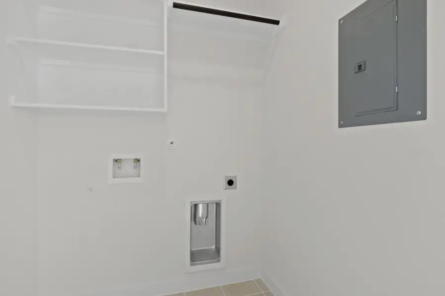 Utility room in the Pecan II home plan by Trophy Signature Homes – REPRESENTATIVE PHOTO Utility room in the Pecan II home plan by Trophy Signature Homes – REPRESENTATIVE PHOTO
