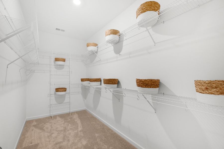 Furnished interior view inside a new home in Sweetgrass at Summers Corner: Coastal Collection, Summerville (Image 6).