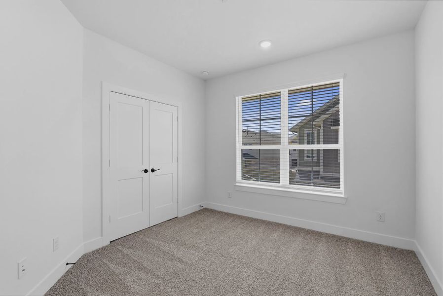 Representative unfurnished interior of a home built from the Dillon by Chesmar Homes in Sienna Courtyard, Missouri City (Image 20).