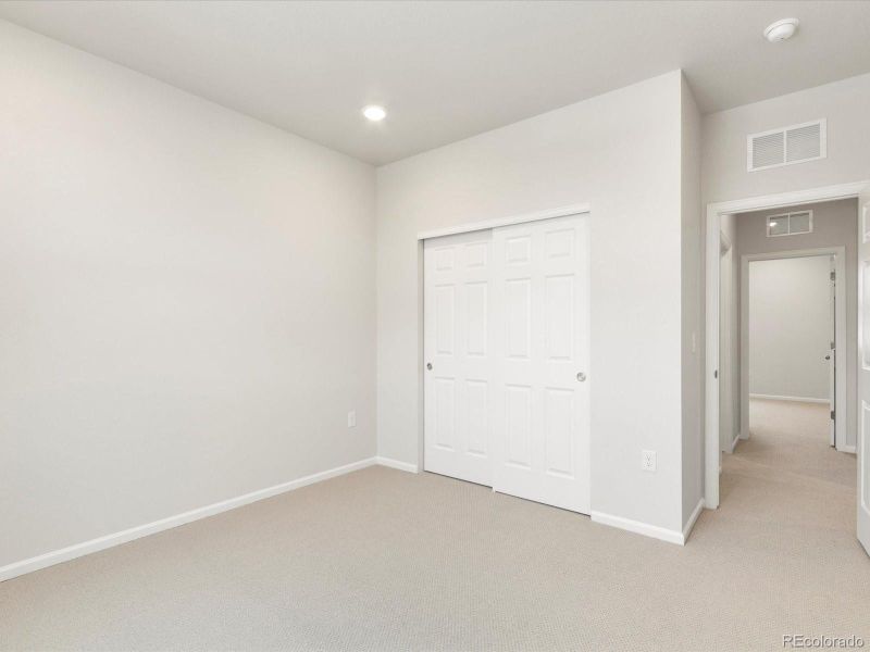 Spacious, unfurnished interior of a new home in Poudre Heights: The Alpine Collection, Windsor (Image 33).