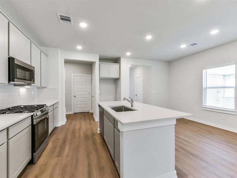 Furnished interior view inside a new home in Windmill Estates, Magnolia (Image 15).
