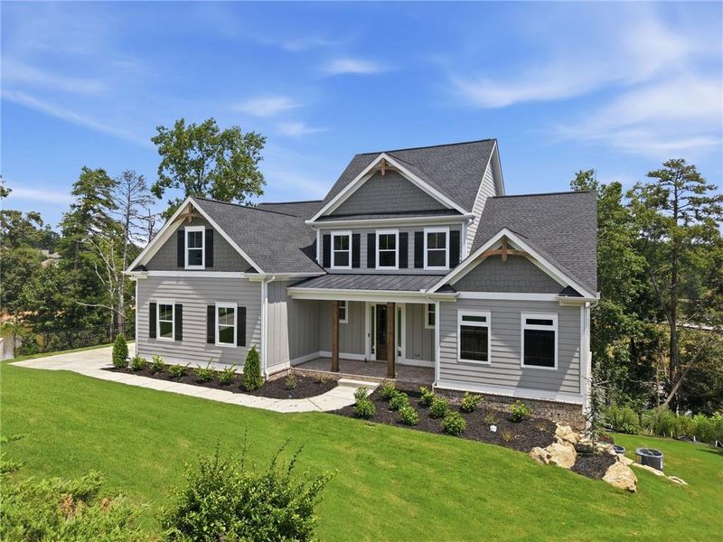 Front exterior of a new home in , Flowery Branch, GA, highlighting curb appeal (Image 27). Front exterior of a new home in , Flowery Branch, GA, highlighting curb appeal (Image 27).